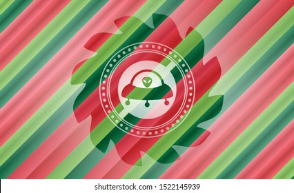 ufo with aline inside icon inside christmas badge background.