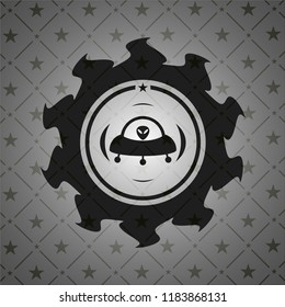 ufo with aline inside icon inside dark emblem. Retro