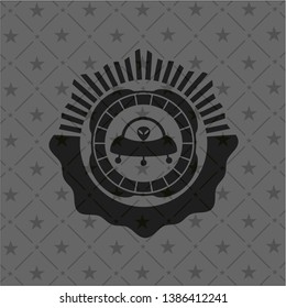 ufo with aline inside icon inside dark badge