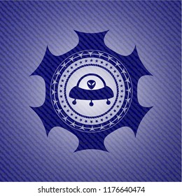 ufo with aline inside icon inside denim background