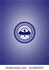 ufo with aline inside icon inside emblem with jean texture