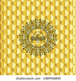 ufo with aline inside icon inside gold badge or emblem. Scales pattern. Vector Illustration. Detailed.