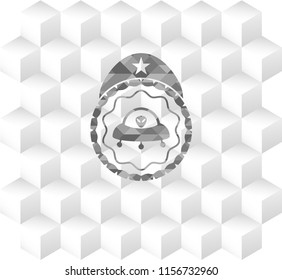 ufo with aline inside icon inside grey emblem with geometric cube white background