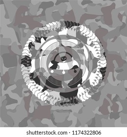 ufo with aline inside icon inside grey camouflage texture