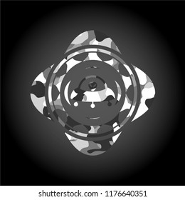 ufo with aline inside icon inside grey camo emblem