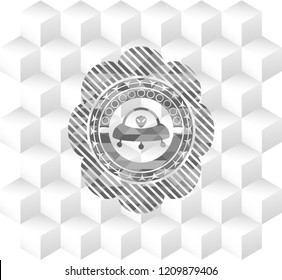 ufo with aline inside icon inside grey emblem. Vintage with geometric cube white background