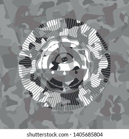 ufo with aline inside icon inside grey camouflage emblem