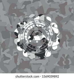 ufo with aline inside icon inside grey camouflage texture