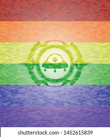 ufo with aline inside icon inside lgbt colors emblem 