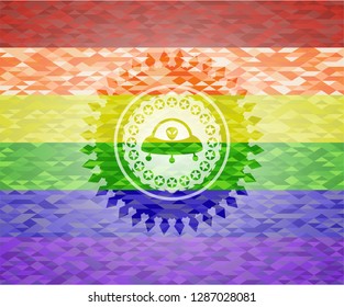 ufo with aline inside icon on mosaic background with the colors of the LGBT flag