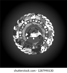 ufo with aline inside icon on grey camouflaged texture