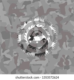ufo with aline inside icon on grey camouflage pattern
