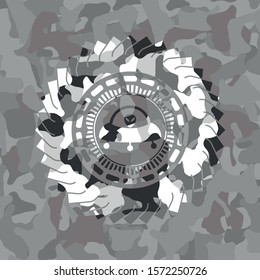 ufo with aline inside icon on grey camouflaged pattern