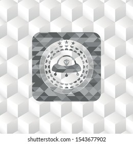ufo with aline inside icon inside realistic grey emblem with cube white background