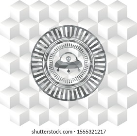 ufo with aline inside icon inside realistic grey emblem with geometric cube white background