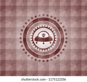 ufo with aline inside icon inside red seamless geometric emblem.