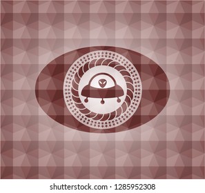 ufo with aline inside icon inside red emblem or badge with geometric pattern background. Seamless.
