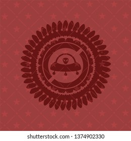 ufo with aline inside icon inside red icon or emblem