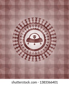 ufo with aline inside icon inside red seamless geometric pattern emblem. Seamless.