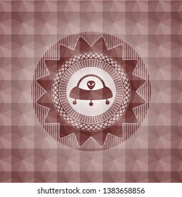 ufo with aline inside icon inside red seamless geometric emblem.