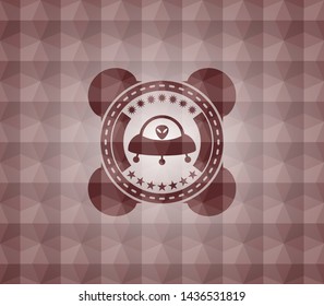 ufo with aline inside icon inside red emblem or badge with abstract geometric polygonal pattern background. Seamless.