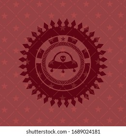 ufo with aline inside icon inside red icon or emblem