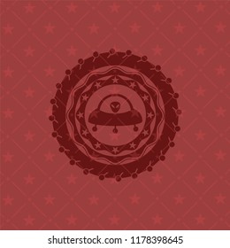 ufo with aline inside icon inside retro style red emblem