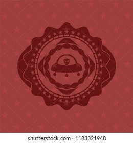 ufo with aline inside icon inside retro red emblem