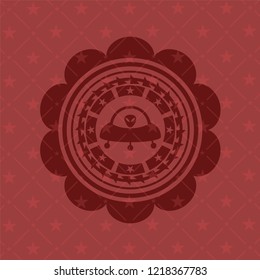 ufo with aline inside icon inside retro red emblem