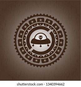 ufo with aline inside icon inside retro style wood emblem