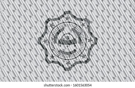 ufo with aline inside icon inside shiny silver badge. Scales pattern. Vector Illustration. Detailed.