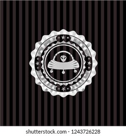ufo with aline inside icon inside silver emblem or badge