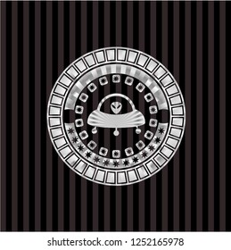 ufo with aline inside icon inside silver emblem