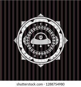 ufo with aline inside icon inside silver shiny emblem