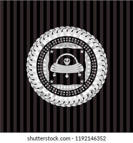 ufo with aline inside icon inside silvery emblem