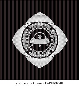 ufo with aline inside icon inside silvery badge or emblem