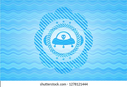 ufo with aline inside icon inside sky blue water emblem background.