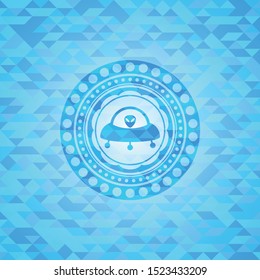 ufo with aline inside icon inside sky blue emblem with mosaic background