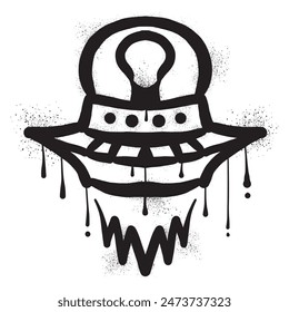 UFO with black spray paint graffiti