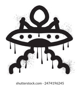 UFO with black spray paint graffiti