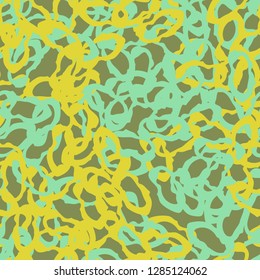 UFO camouflage of various shades of green, blue and yellow colors. It is a colorful seamless pattern that can be used as a camo print for clothing and background and backdrop or computer wallpaper