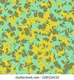 UFO camouflage of various shades of green, blue and yellow colors. It is a colorful seamless pattern that can be used as a camo print for clothing and background and backdrop or computer wallpaper