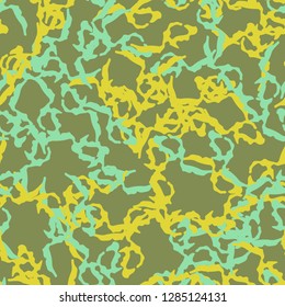 UFO camouflage of various shades of green, blue and yellow colors. It is a colorful seamless pattern that can be used as a camo print for clothing and background and backdrop or computer wallpaper