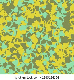 UFO camouflage of various shades of green, blue and yellow colors. It is a colorful seamless pattern that can be used as a camo print for clothing and background and backdrop or computer wallpaper