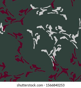 Ufo camouflage of various shades of green, red and white colors. It is a colorful seamless pattern that can be used as a camo print for clothing and background and backdrop or computer wallpaper