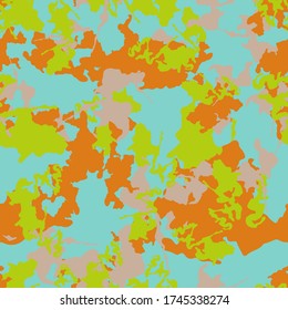 UFO camouflage of various shades of green, blue, orange and grey colors. It is a colorful seamless pattern that can be used as a camo print for clothing and background and backdrop or computer wallpap