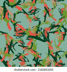 UFO camouflage of various shades of green, red and beige colors. It is a colorful seamless pattern that can be used as a camo print for clothing and background and backdrop or computer wallpaper