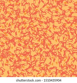 UFO camouflage of various shades of orange and red colors. It is a colorful seamless pattern that can be used as a camo print for clothing and background and backdrop or computer wallpaper