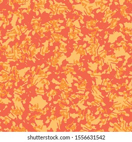 UFO camouflage of various shades of orange and red colors. It is a colorful seamless pattern that can be used as a camo print for clothing and background and backdrop or computer wallpaper