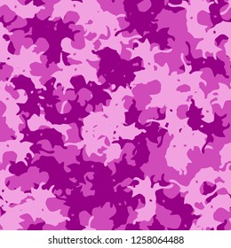 UFO camouflage of various shades of pink and purple colors. It is a colorful seamless pattern that can be used as a camo print for clothing and background and backdrop or computer wallpaper